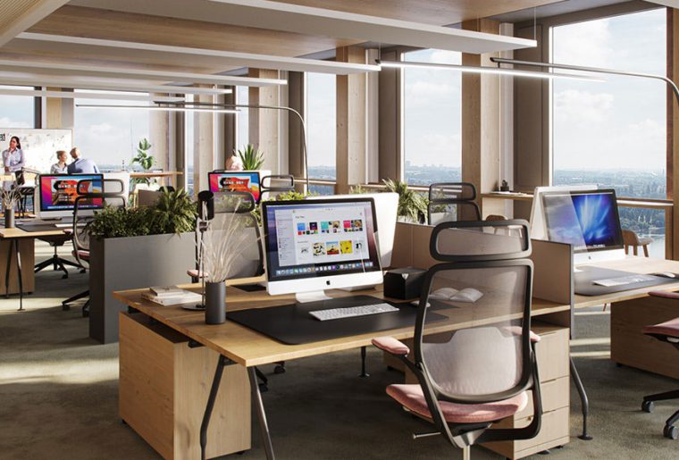Ein modernes Büro indem viel Holz verwendet wurde mit begrünten Arbeitsplätzen